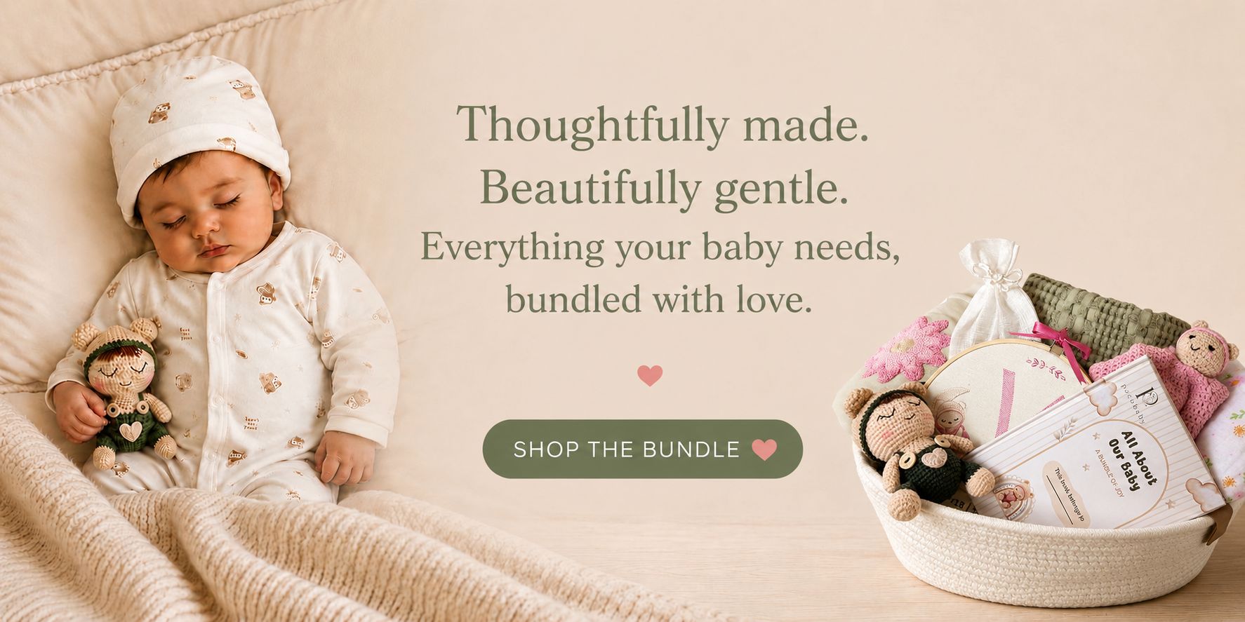 A sleeping newborn baby wearing a white onesie and hat with small gold motifs, lying on a cream blanket next to a small doll. On the right, a basket holds baby accessories and books, with overlaid text reading 'Thoughtfully made.
