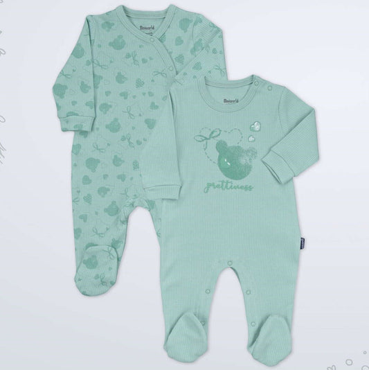 A two-piece baby sleepwear set in mint green, featuring a long-sleeve footed sleeper with a heart pattern and a matching long-sleeve bodysuit with a bear graphic and the word 'petit'.